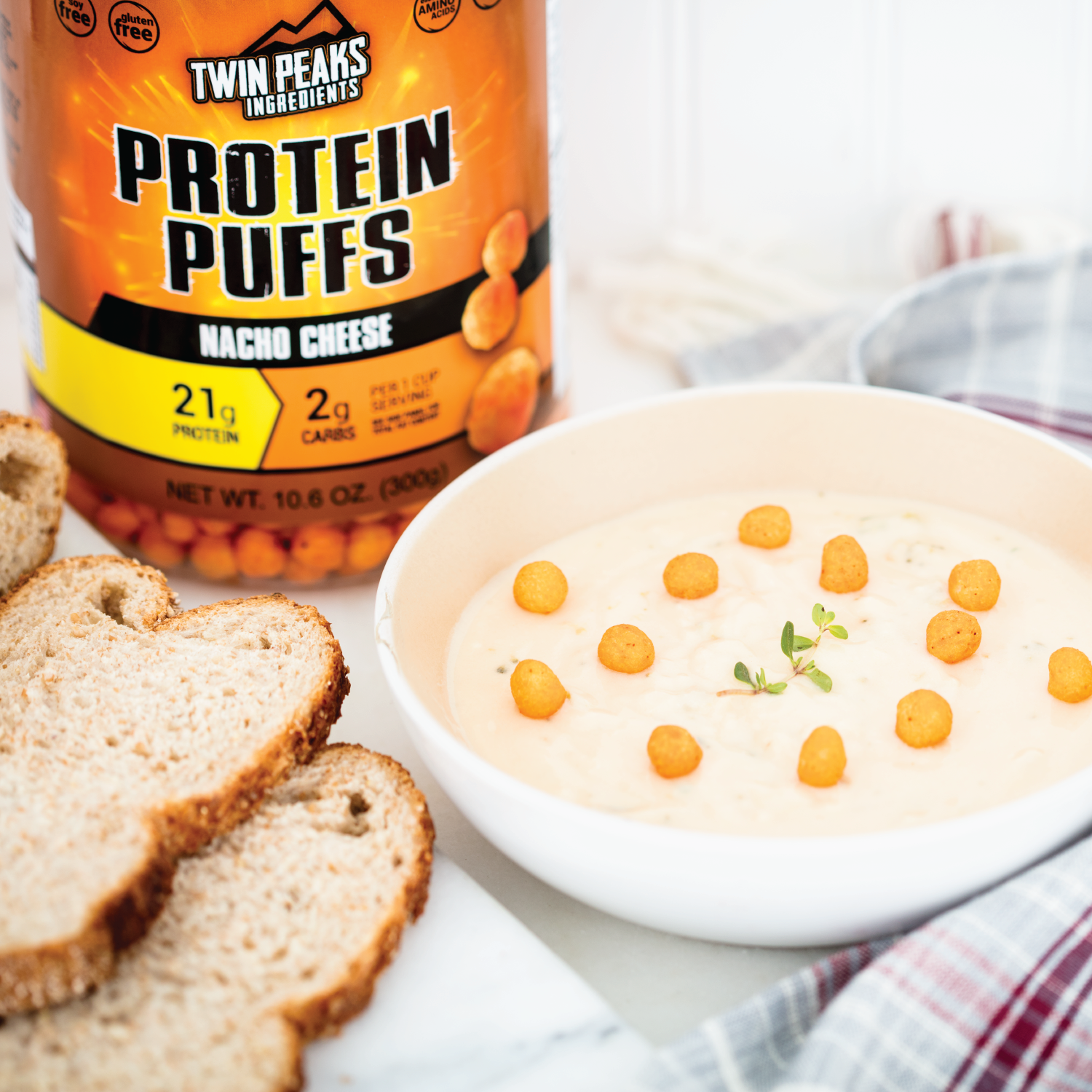 Nacho Cheese Protein Puffs in a Soup as a Topping